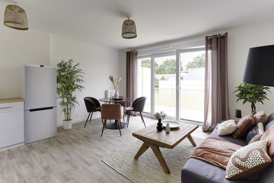 Programme immobilier neuf Terra Cotta à Pont-Péan - Visite de l'appartement témoin - Salon - Lamotte