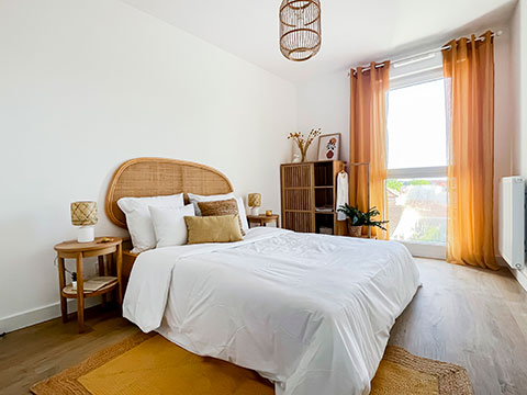 Journées portes ouvertes - Programme immobilier neuf Villa Eugénie à Biscarrosse (40) - Chambre dans l'appartement témoin - Lamotte