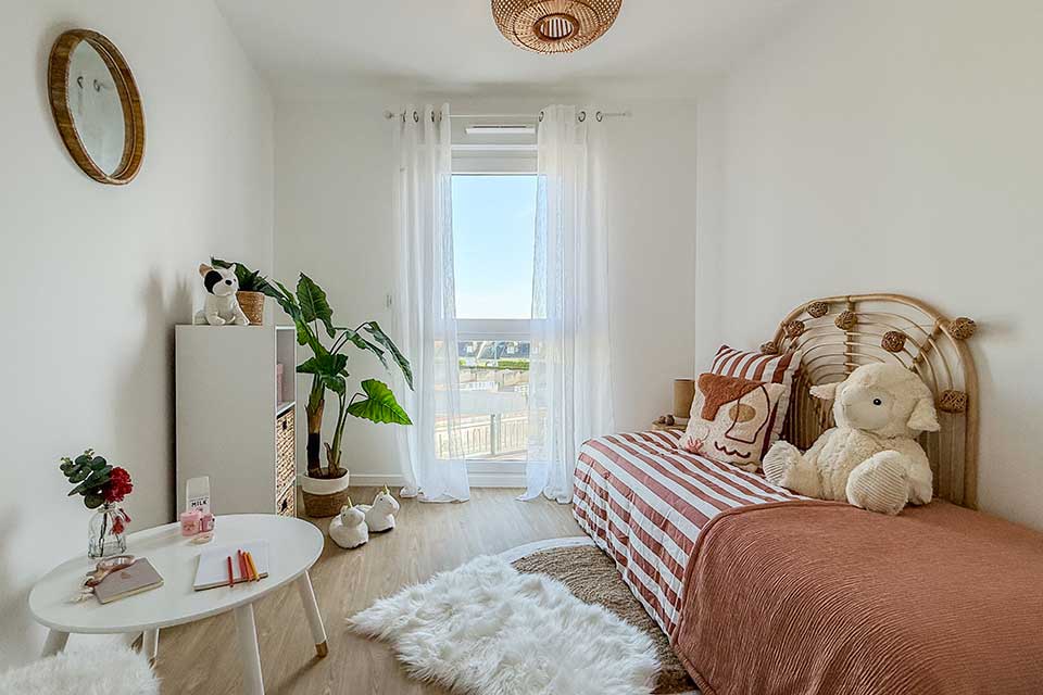 Programme immobilier neuf Terra Serena à Pont-Péan (35) - Chambre d'enfant dans l'appartement témoin - Lamotte